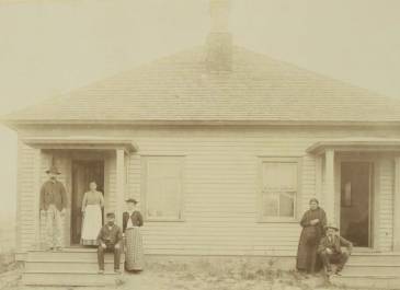 Devils Lake 1890 - Charles E. Crandall Photograph Collection - Two-family home of Mr. Beesaw & Mr. and Mrs. Grant 