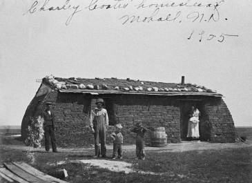 Mohall 1905 - Renville County Historical Society - Charley Coates family stand in front of their sod house homestead southwest of Mohall, Renville Co 