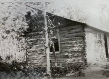 Holmes Township Rolette County - "1934 photograph with a note (Our first home) by my grandmother, Laura (Sager) Strietzel. The log cabin constructed ca. 1890 of Turtle Mountain logs sourced on site." Submitted by Becky Leonard