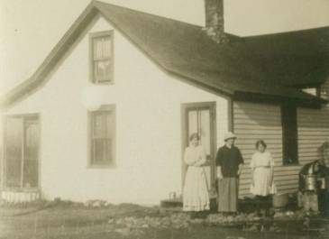 Ada Township 1907 - Stanley Halonen Family Collection - John and Elizabeth Martinson Farm Home, Finnish homesteaders home built in 1907, next to a sodhouse. John Pirttikangas Martinson. Dickey County, SE of Ellendale