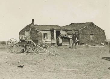 Temvik 1905 - A - A Collection - Mr. and Mrs. H. J. Benedict at their sod house
