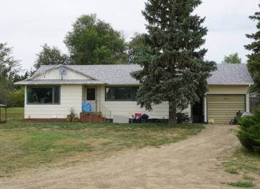 Scranton -  "This was the house on my great grandparent’s farm in Scranton, ND that my grandfather built himself in 1962." Kayla Axtman, NDHFA Employee
