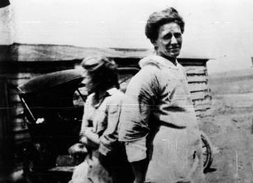 Mrs. Walter Bailey Sr., and Rena and Fred at their homestead